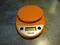 Weighing apples using digital scales.